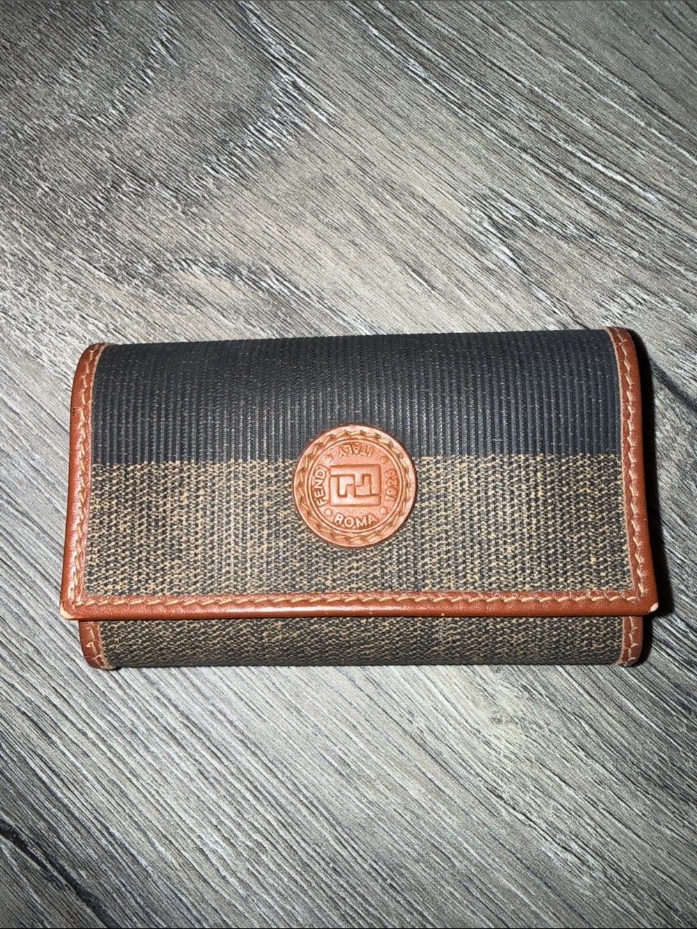 Fendi Brown and Black Folded Card Case with Leather Trim (missing one tooth)